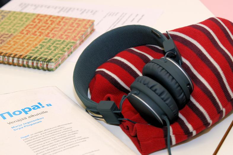 Textbooks and headphones