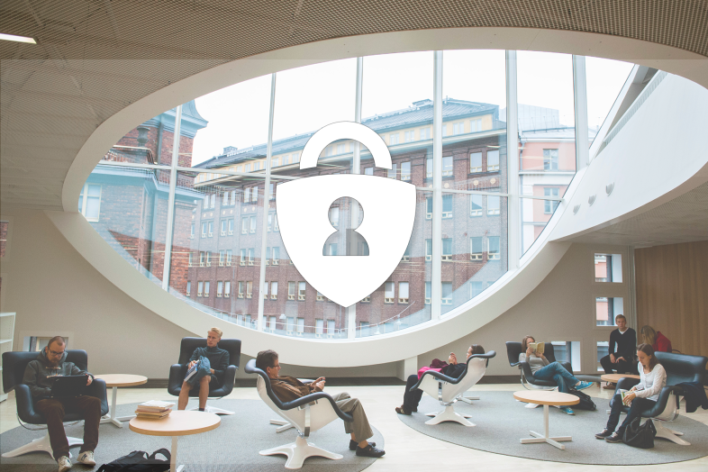 People sitting at the University premises with laptops on their laps. There is also a lock icon visible as an icon of secure login.