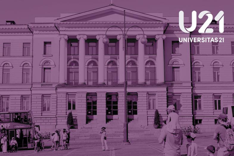 In the background, the facade of the University's main building, with the text "U21 Universitas 21" in the foreground.