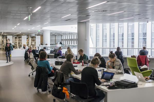 Students working in the library of Kaisa House